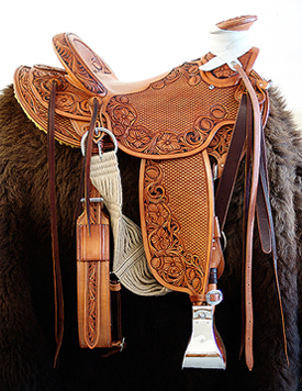Specs: Wade Tree - by Rick Reed 93 degree Bars 16 inch seat, 7/8ths flat plate riggin, 4 - 1/2 inch Stainless Steel Stirrups, Cantle is 4 and 1/2 inches hight X 12 and 1/2 inches wide,  2 inch tooled Cheyenne Roll, All Stainless Steel Hardware - By Harwood, Santa Barbarbra Twisted Stirrup Leathers, Smooth Back Cinch